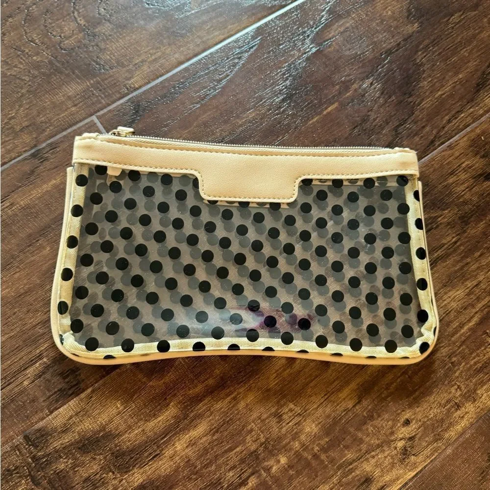 See-through black and tan polkadotted cosmetic bag